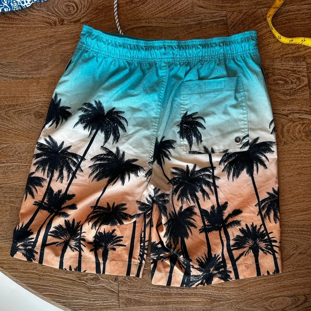 Sonoma Small swim trunks blue and brown.